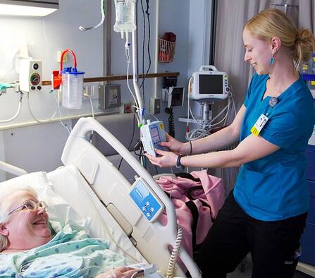 Nurse working with a patient