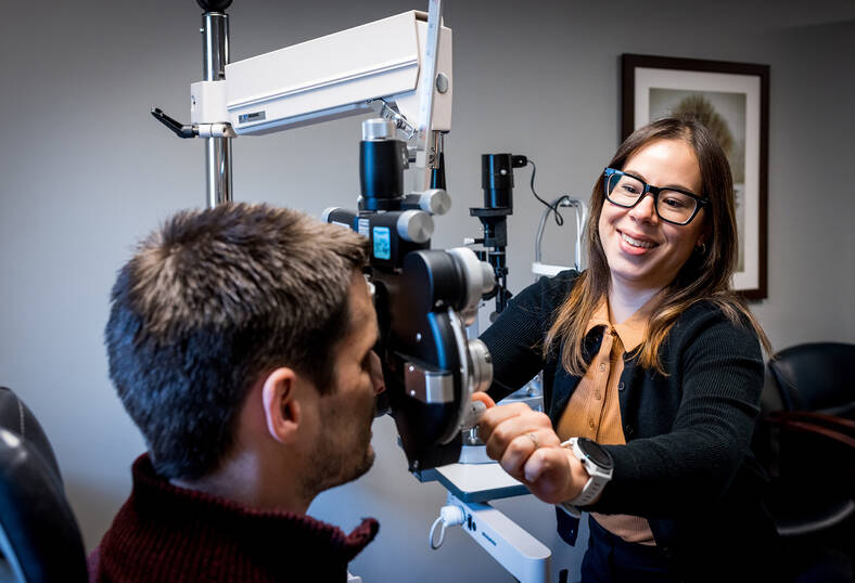 Dr. Lauren J. Pallet, OD, MS, FAAO, Ophthalmologist at Mt Ascutney hospital and health center, setting up patient for eye exam